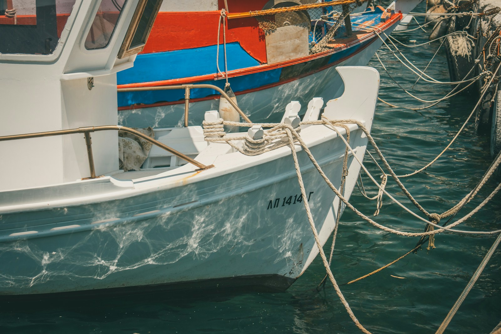 a couple of boats that are sitting in the water